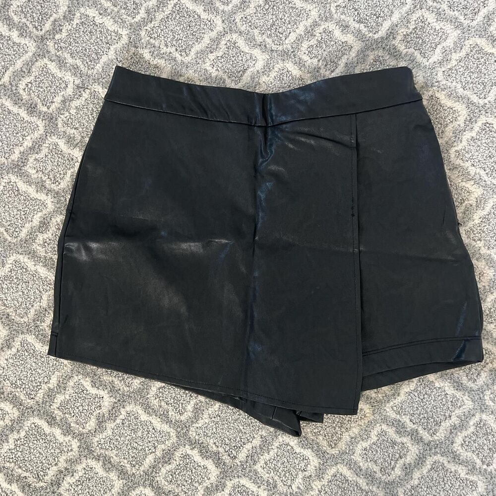 Black faux leather mini skirt